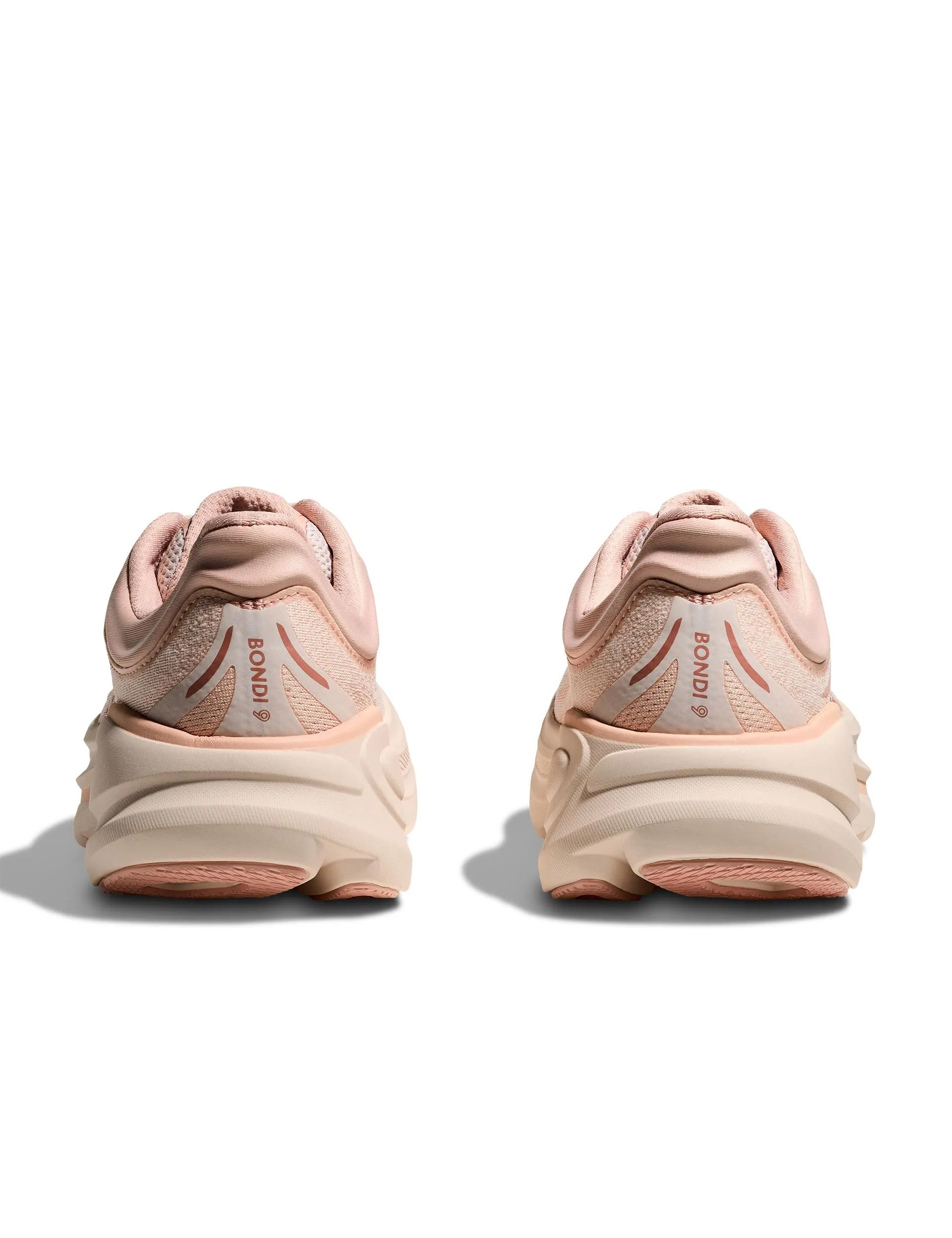 Bondi 9 - Rose Latte/Rose Cream running in a steppe area shoes
