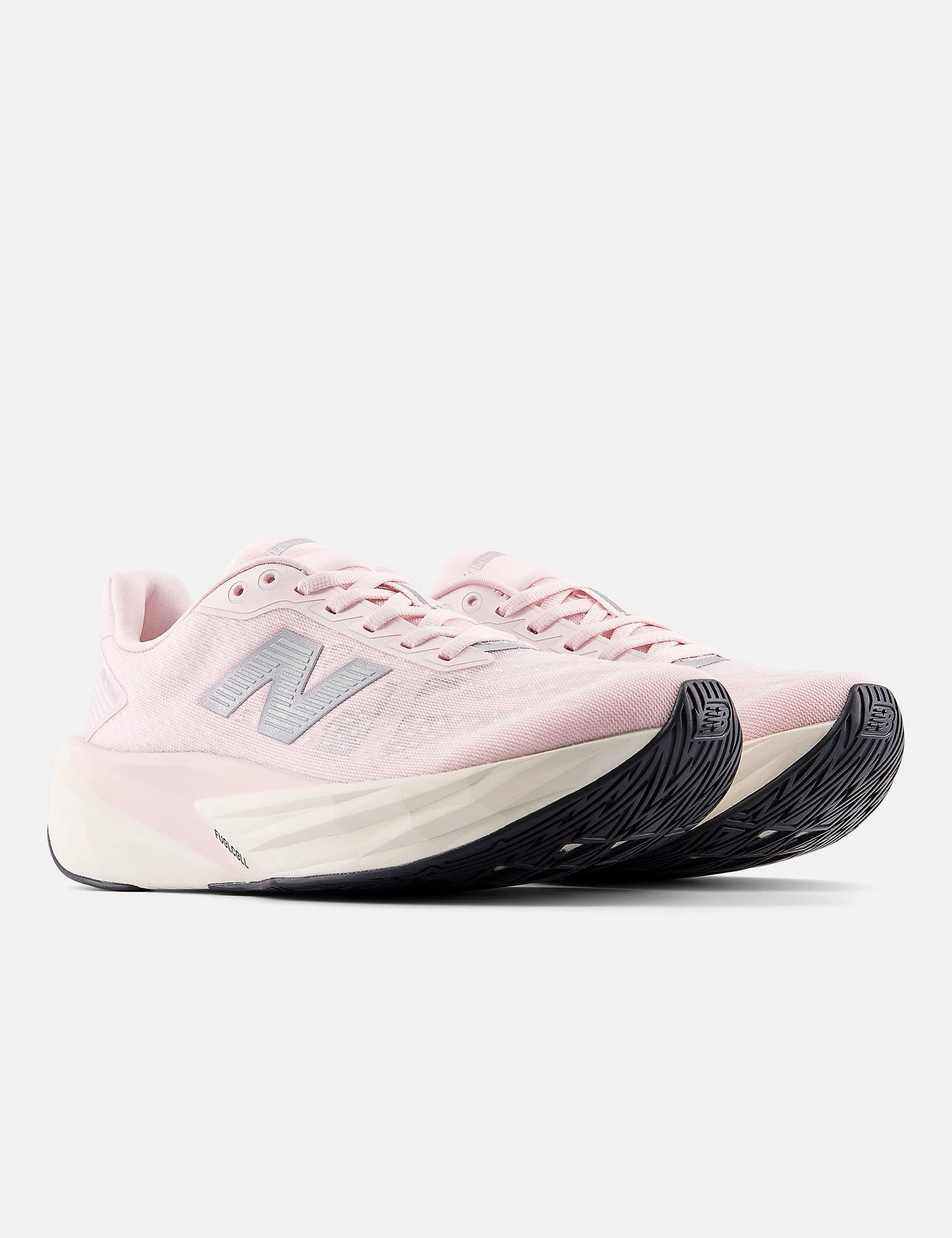 light colors running in a rope bridge area shoes FuelCell Rebel v5 Shoes - Pink Granite