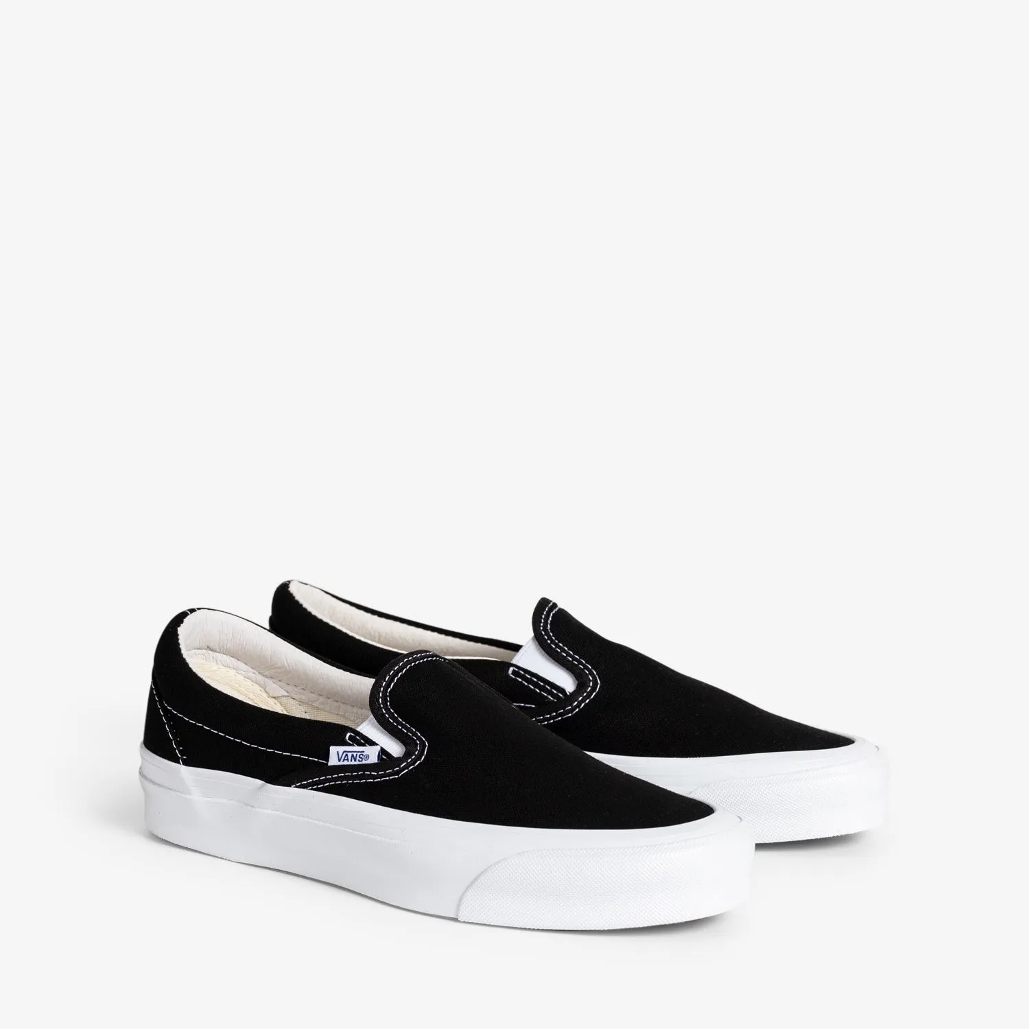 OG Classic Slip-On LX Black | True White Rocker Sole Technology Foot Comfort