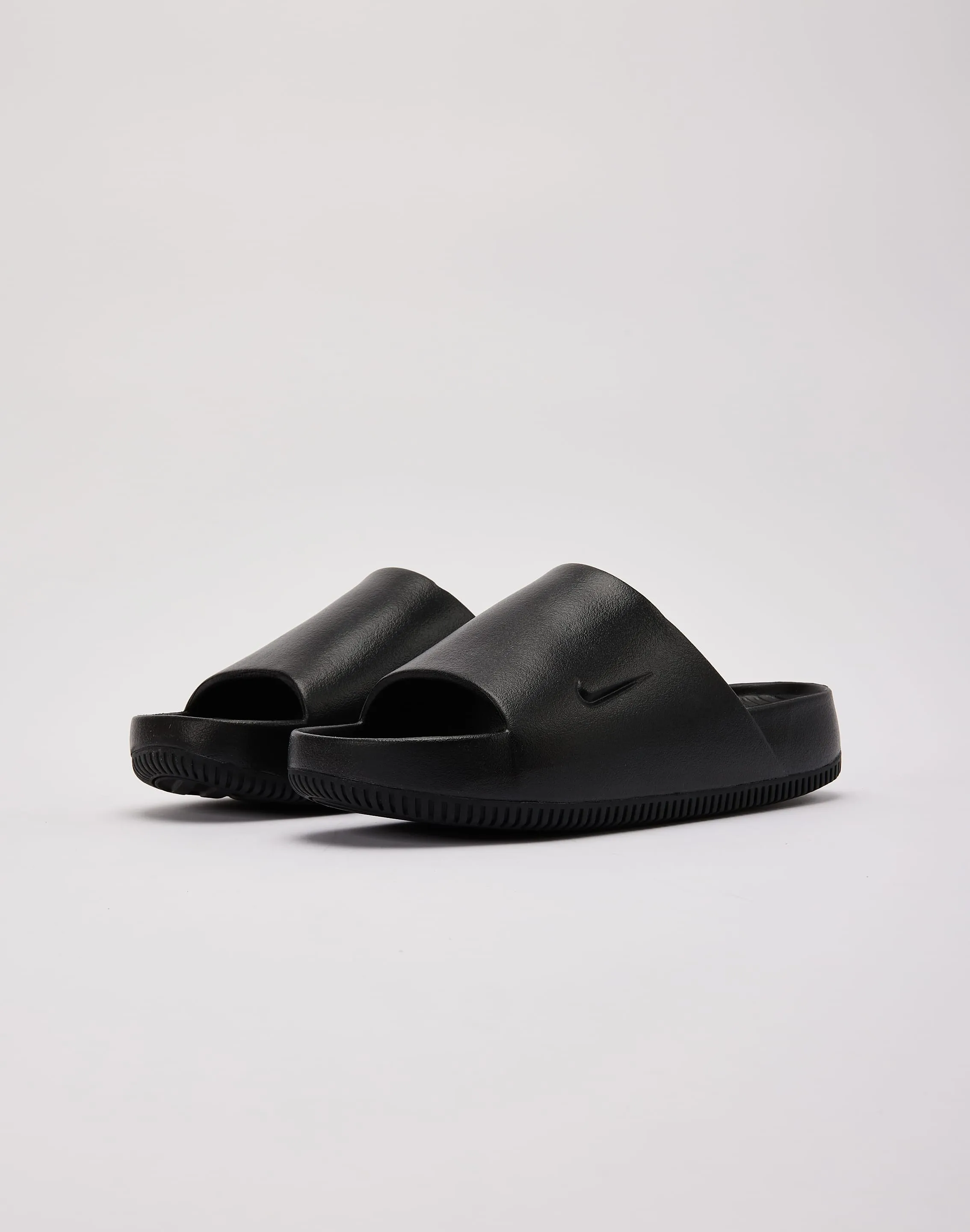 Stable base Nike Calm Slides