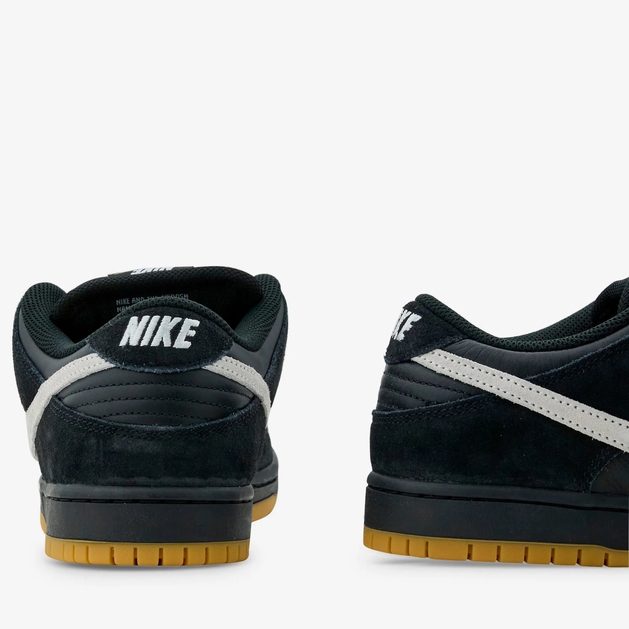 SB Dunk Low Pro Black | White | Black Campus Life